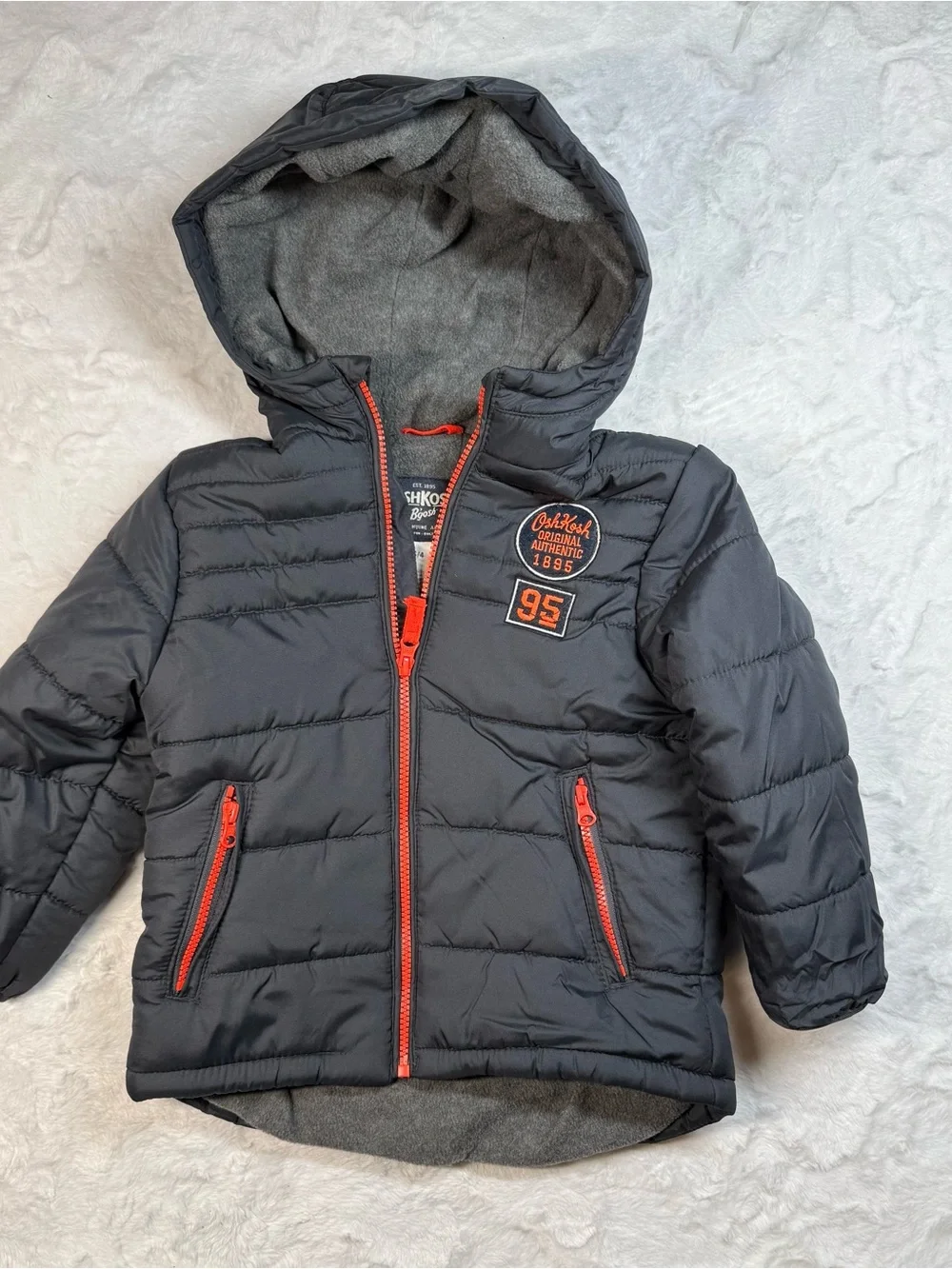 Osh Kosh B’Gosh Kids Hooded Puffer Jacket in Charcoal with Orange Accents